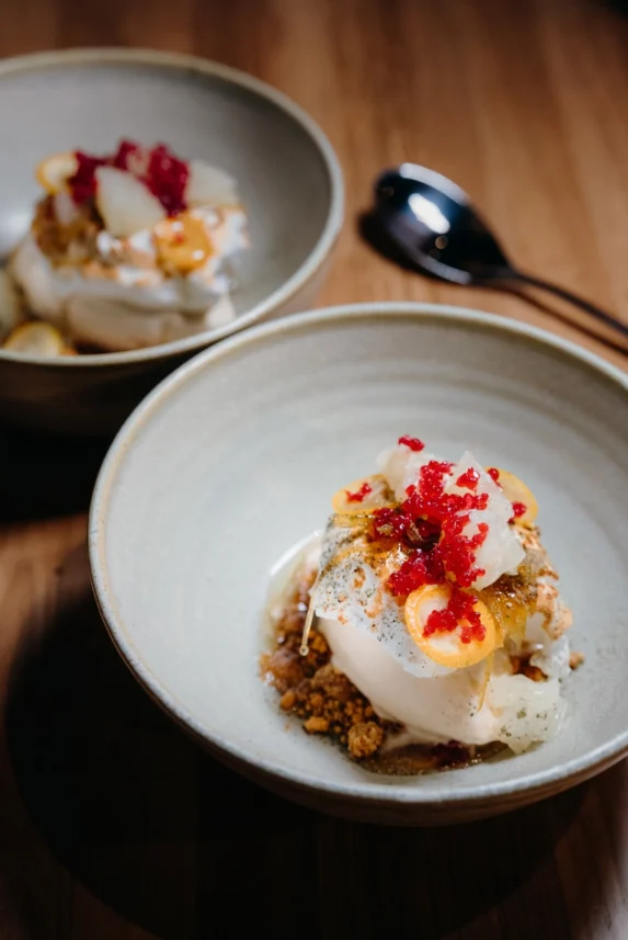 Seasonal dessert with citrus, granita, and cream – modern Australian fine dining at Peonee Restaurant Canberra.